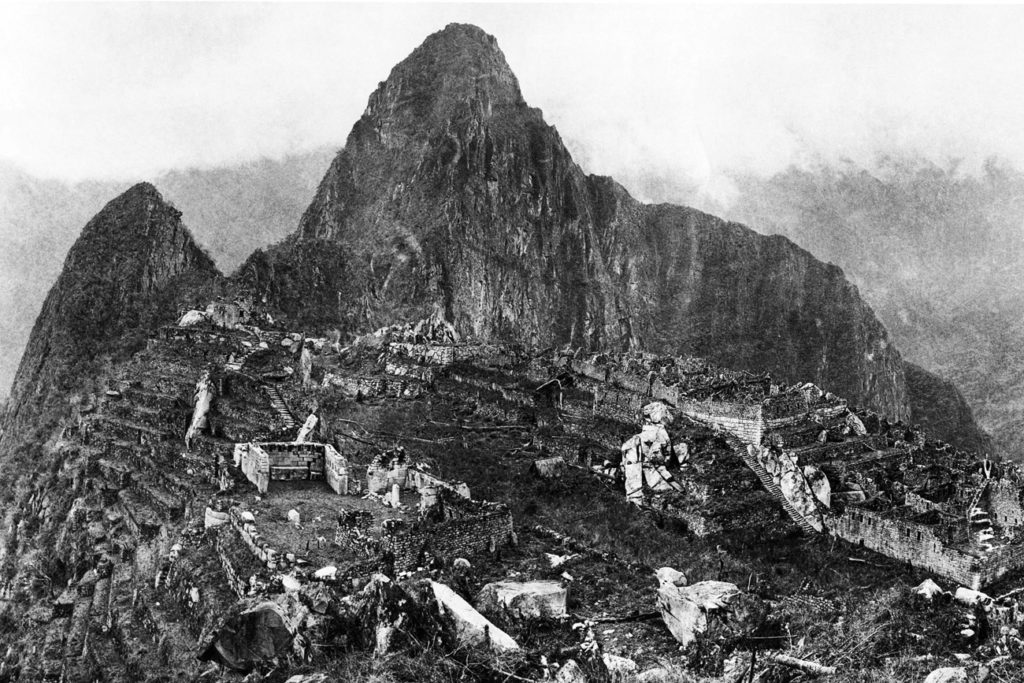 Photograph of the Machu Picchu in 1912 before reconstruction work (black & white)